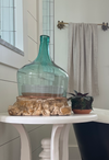 carved wood pillar base with demijohn cloche