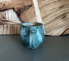 handmade pottery creamer with floral design